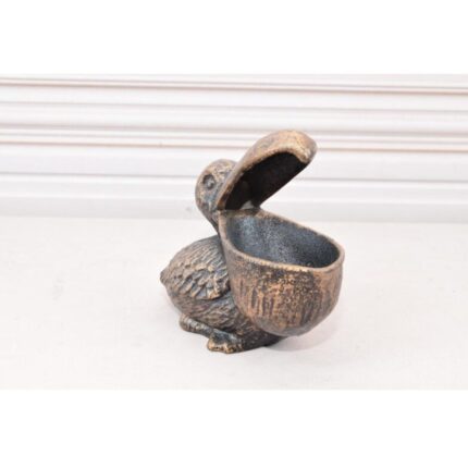 VINTAGE CAST IRON FUNNY PELICAN STATUE
