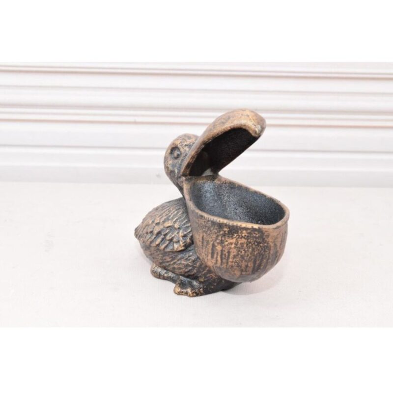 VINTAGE CAST IRON FUNNY PELICAN STATUE