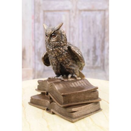OWL ON BOOKS STATUE