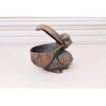VINTAGE CAST IRON FUNNY PELICAN STATUE