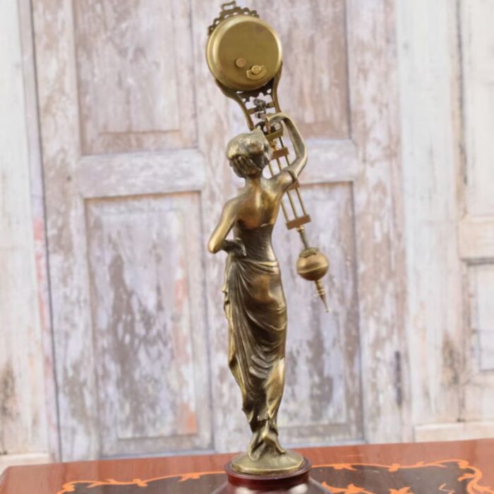 AMAZING BRONZE AND METAL CLOCK SCULPTURE