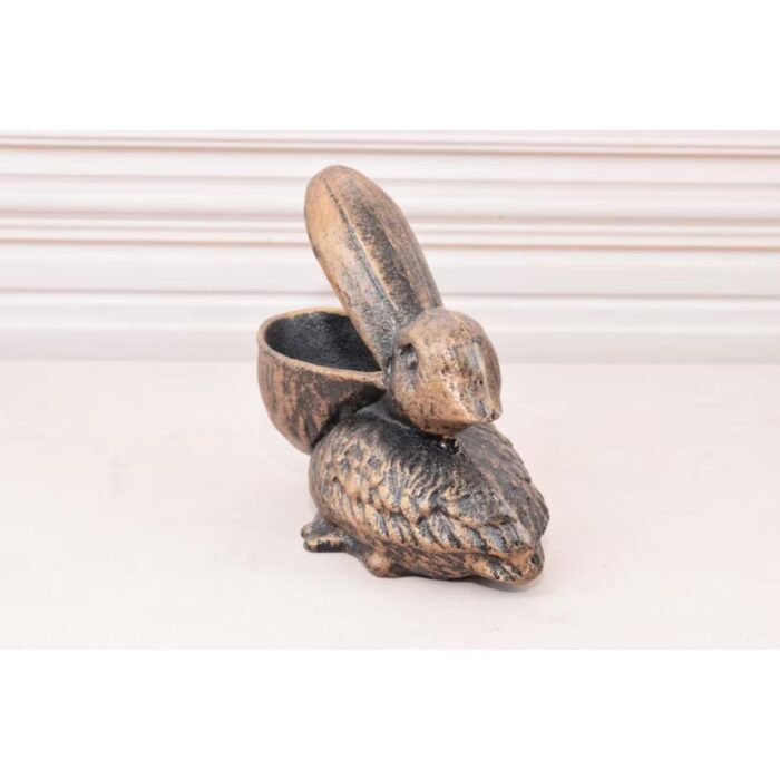 VINTAGE CAST IRON FUNNY PELICAN STATUE