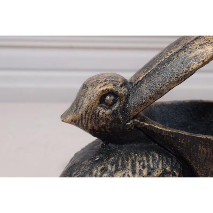 VINTAGE CAST IRON FUNNY PELICAN STATUE