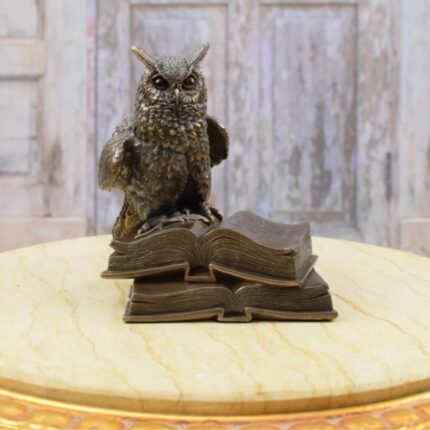 OWL ON BOOKS STATUE