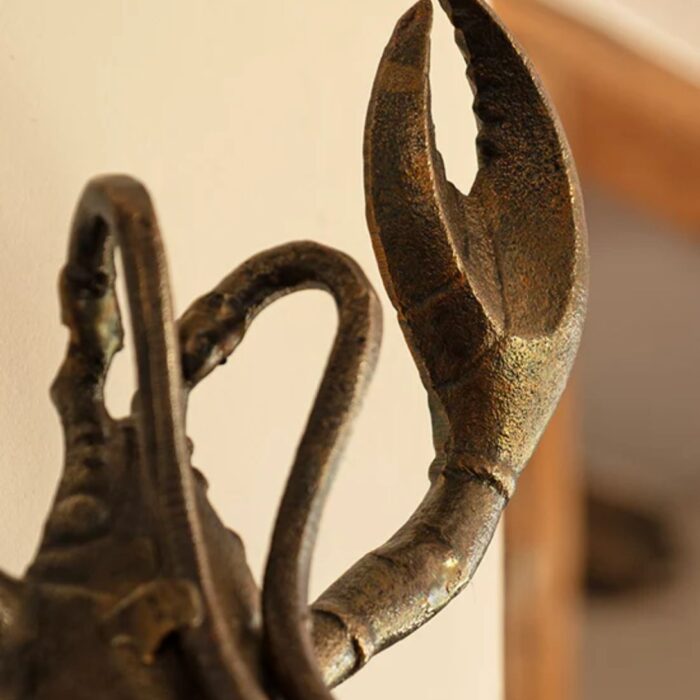 BRASS-EFFECT LOBSTER WALL LIGHT