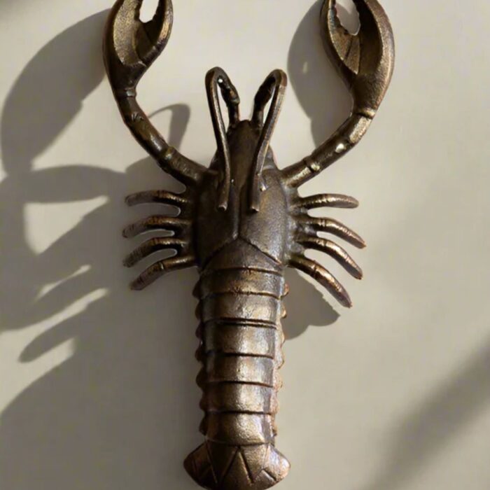 BRASS-EFFECT LOBSTER WALL LIGHT