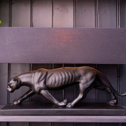 BLACK PANTHER LAMP BASE WITH A BLACK AND GOLD LAMP SHADE