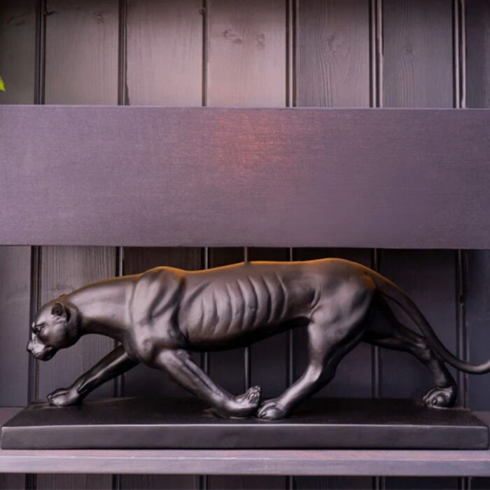 BLACK PANTHER LAMP BASE WITH A BLACK AND GOLD LAMP SHADE