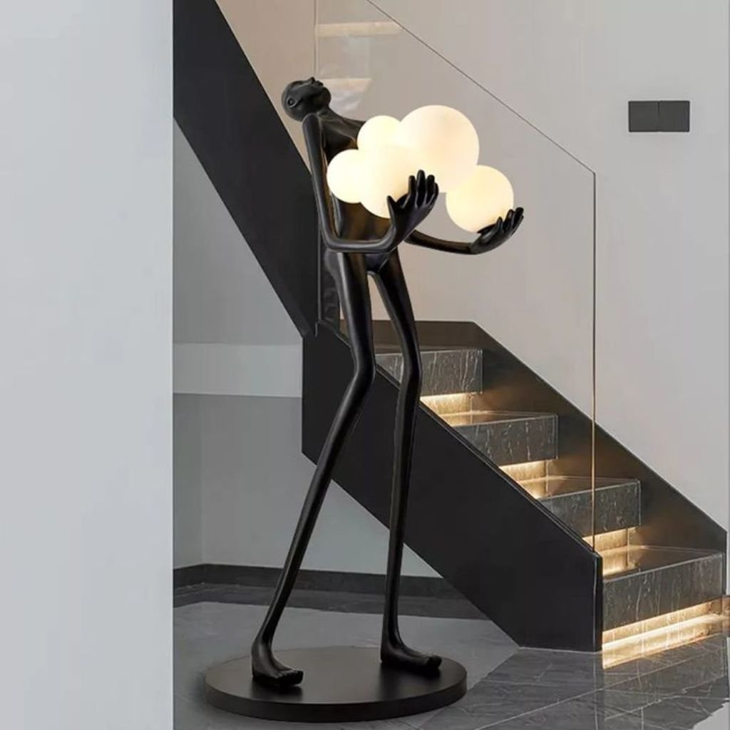 2 FIGURE HOLDING FLOATING GLOBES SCULPTURAL FLOOR LAMP