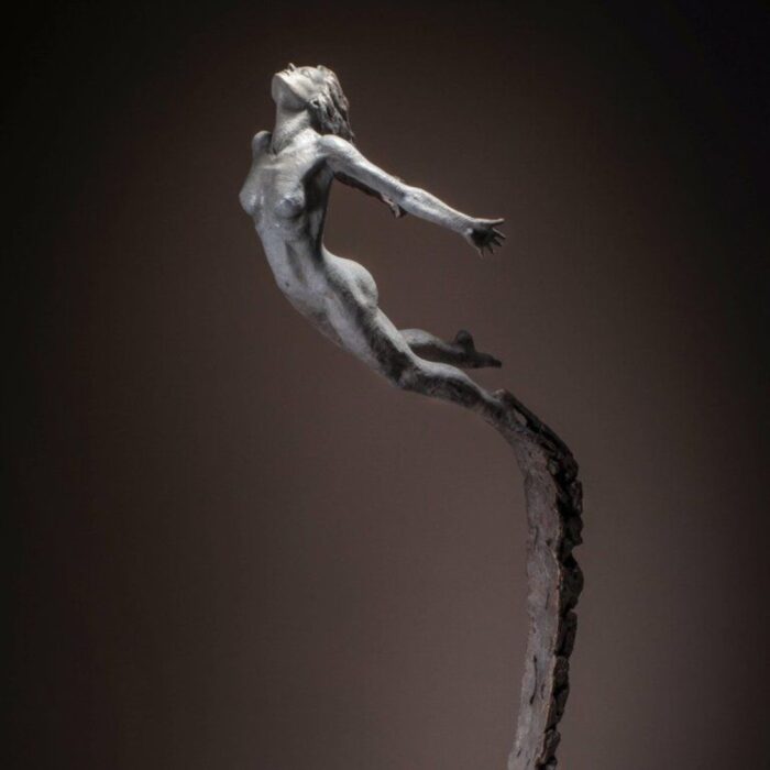 FREE SPIRITED FIGURE WITH FLOWING BASE SCULPTURAL FLOOR LAMP