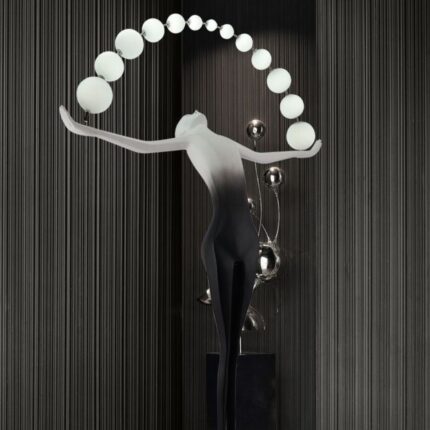 SCULPTURAL FLOOR LAMP FIGURE WITH ARCHING ORBS