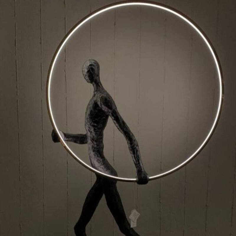 SCULPTURAL FLOOR LAMP FIGURE WITH GLOWING CIRCLE