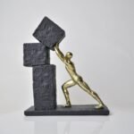 VERTICAL GOLD STRIVE FIGURINE