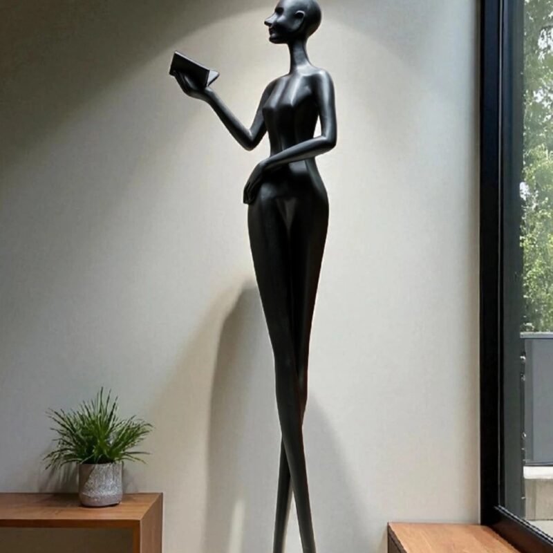 POISED READER FLOOR SCULPTURE