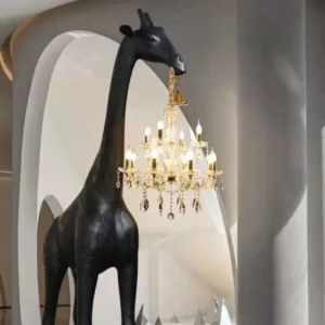 Black arc floor lamp positioned beside leather sofa providing reading light