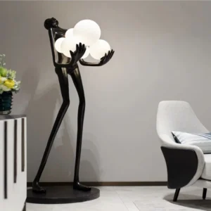 Abstract Figure Holding Light Orbs sculptural floor lamp in contemporary living room