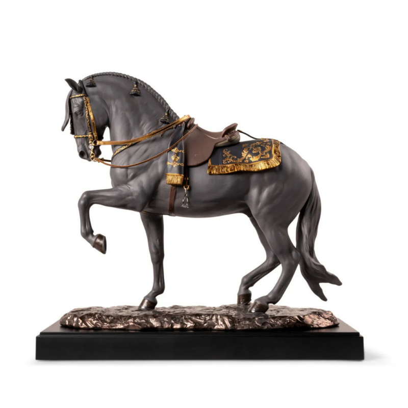 SPANISH PURE BREED BLACK HORSE SCULPTURE in piaffe stance with gold luster saddle, bridle, and genuine leather reins
