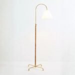 CURVES FLOOR LAMP WITH METAL FRAME AND RATTAN SHADE