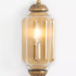 THE ELOISE SCALLOP CLEAR GLASS WALL SCONCE IN BRASS