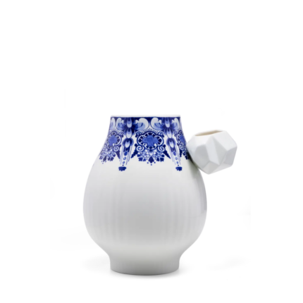 DELFT BLUE SIDE OPENING VASE BY MARCEL WANDERS with blue pattern, rounded body, and faceted diamond-shaped side opening
