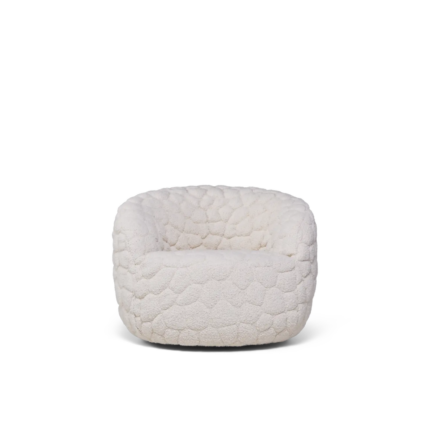 The INTROVERT CHAIR BY ROBBIE WILLIAMS — wide rounded white 3D fabric armchair with pebbled texture on white background