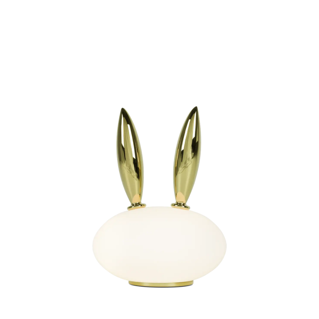 RABBIT PET TABLE LAMP BY MARCEL WANDERS — frosted opal blown glass oval body with two tall polished gold gilded porcelain rabbit ears and circular gold base RABBIT PET TABLE LAMP BY MARCEL WANDERS — frosted opal blown glass oval body with two tall polished gold gilded porcelain rabbit ears and circular gold base