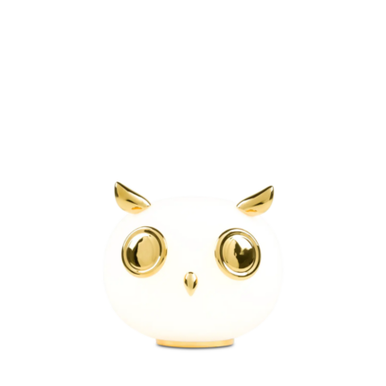 OWL PET TABLE LAMP BY MARCEL WANDERS — glass body with two large gold circular eyes, small curved ear tufts, tiny gold beak, and gold circular base