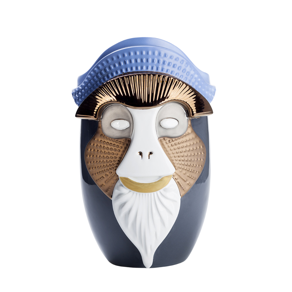 PRIMATES BRAZZA NAVY VASE BY ELENA SALMISTRARO — navy ceramic vase sculpted as Brazza's monkey face with gold details, blue crest, copper cheeks. H.40 cm. PRIMATES BRAZZA NAVY VASE BY ELENA SALMISTRARO — navy ceramic vase sculpted as Brazza's monkey face with gold details, blue crest, copper cheeks. H.40 cm.