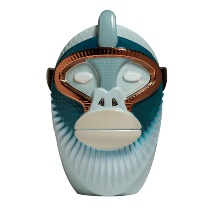 PRIMATES KANDTI GLOSSY LIGHT BLUE CERAMIC WITH METAL DETAILS VASE — ice blue ribbed face vase with copper eye surround and silver nose by Salmistraro