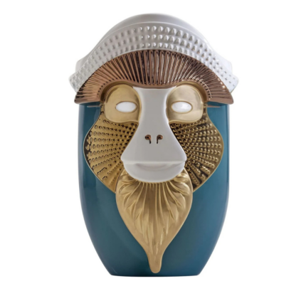 PRIMATES BRAZZA BLUE CERAMIC WITH METAL DETAILS VASE with stylized mandrill face, white dot-relief beret crown front view