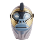 PRIMATES KANDTI GLOSSY LILAC CERAMIC WITH METAL DETAILS VASE with sculpted ape face, gold scale-texture panels, steel blue face mask, and navy spike crest, front view