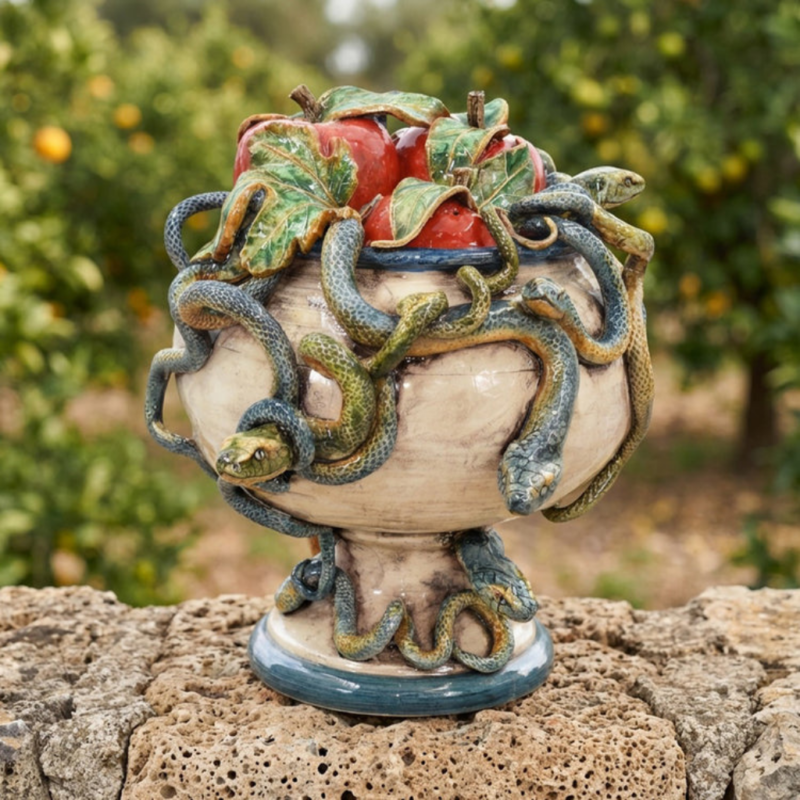 EDEN SICILIAN MAIOLICA DECORATIVE SCULPTURE with coiling painted snakes, red apple and leaf crown, and cream mother-of-pearl glaze by Ceramiche Sofia