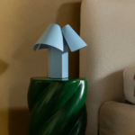TABLE LAMP BELN POWDER BLUE with hexagonal rectangular block base and three overlapping softly rolled curved shade panels