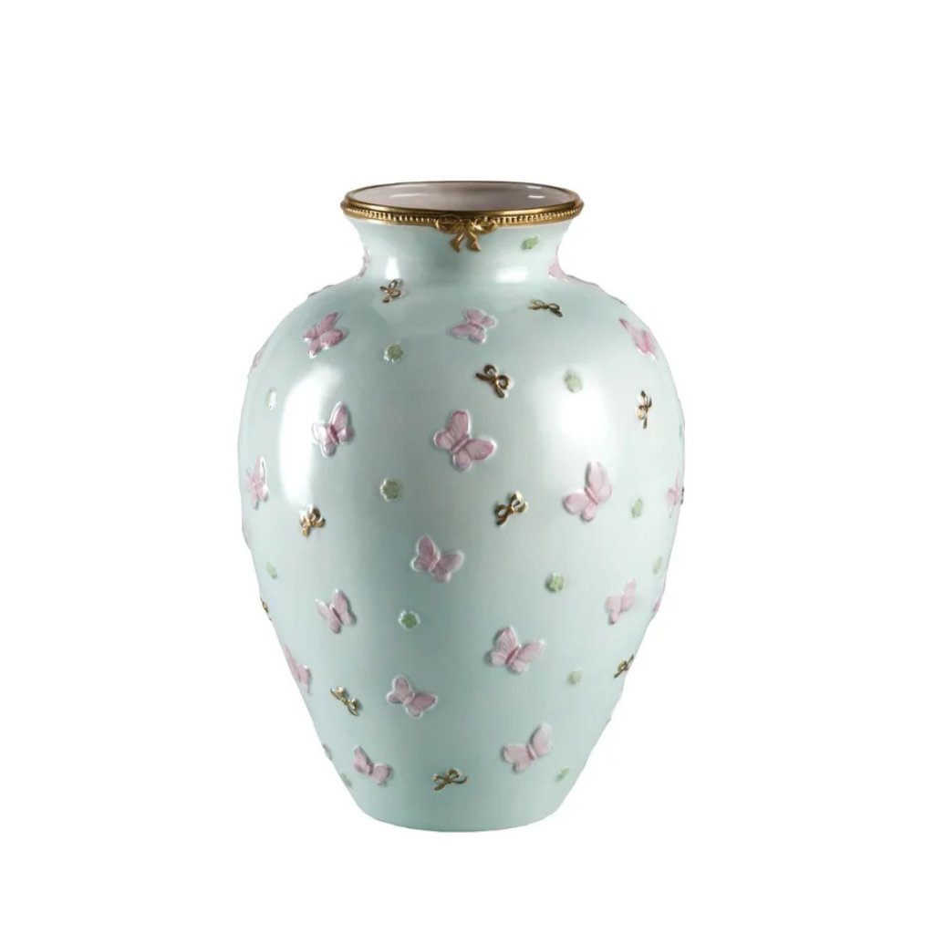 BUTTERFLY VASE AQUAMARINE — mint green porcelain urn with raised pink butterfly relief and 24ct gold bow accents BUTTERFLY VASE AQUAMARINE — mint green porcelain urn with raised pink butterfly relief and 24ct gold bow accents