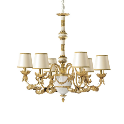JOSEPHINE CHANDELIER 6 LIGHTS WHITE GOLD in white and 24ct gold-plated brass with handmade porcelain center, ornate gold leaf arms, and cream silk satin shades