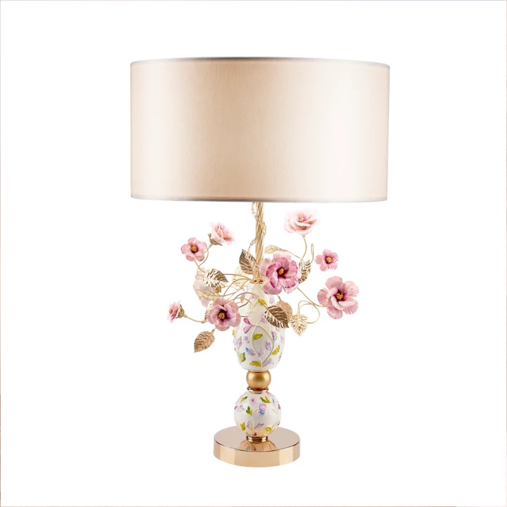 TAORMINA TABLE LAMP MULTICOLOR GOLD with hand-painted multicolor porcelain body, sculpted pink porcelain flowers, gold leaf stems, and blush drum shade, made in Italy TAORMINA TABLE LAMP MULTICOLOR GOLD with hand-painted multicolor porcelain body, sculpted pink porcelain flowers, gold leaf stems, and blush drum shade, made in Italy
